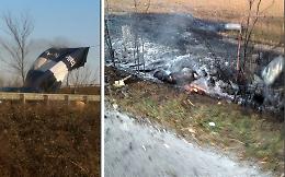 Mongolfiere, una su un albero e un'altra in fiamme