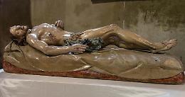 «L’autore del Cristo deposto illuminato dai segni di fede»