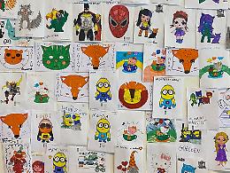 Covid, il coraggio dei bambini nei disegni appesi all'hub