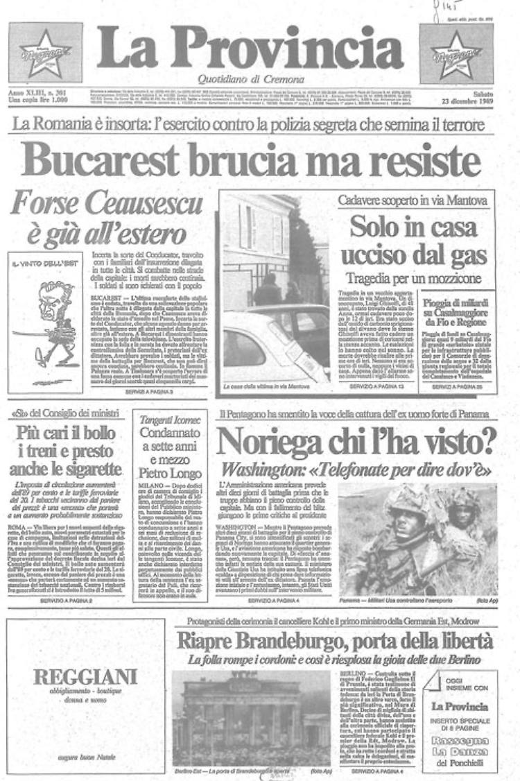 Bucarest. La città è in fiamme e Ceausescu è in fuga - Berlino. Riapre la porta di Brandeburgo