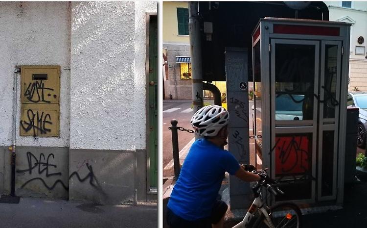 Vandali con la bomboletta, vernice su cabina e muri
