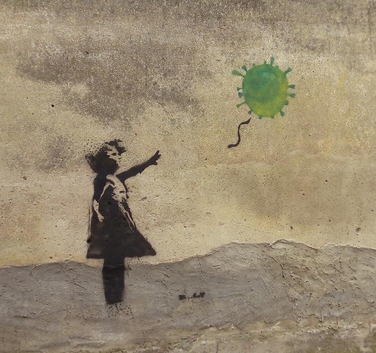 Coronavirus, un emulo di Bansky ha dipinto la speranza